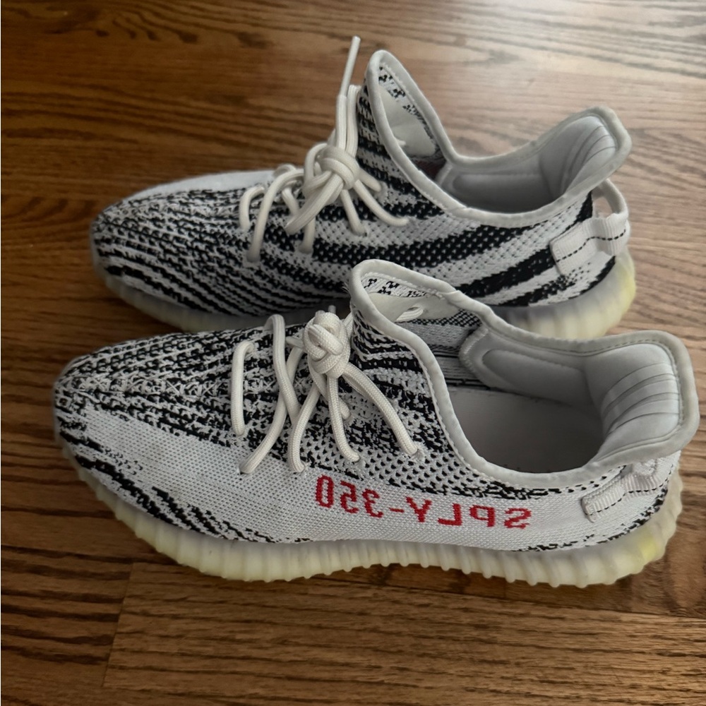 Yeezy Black and White Sneakers with Boost Cushioning